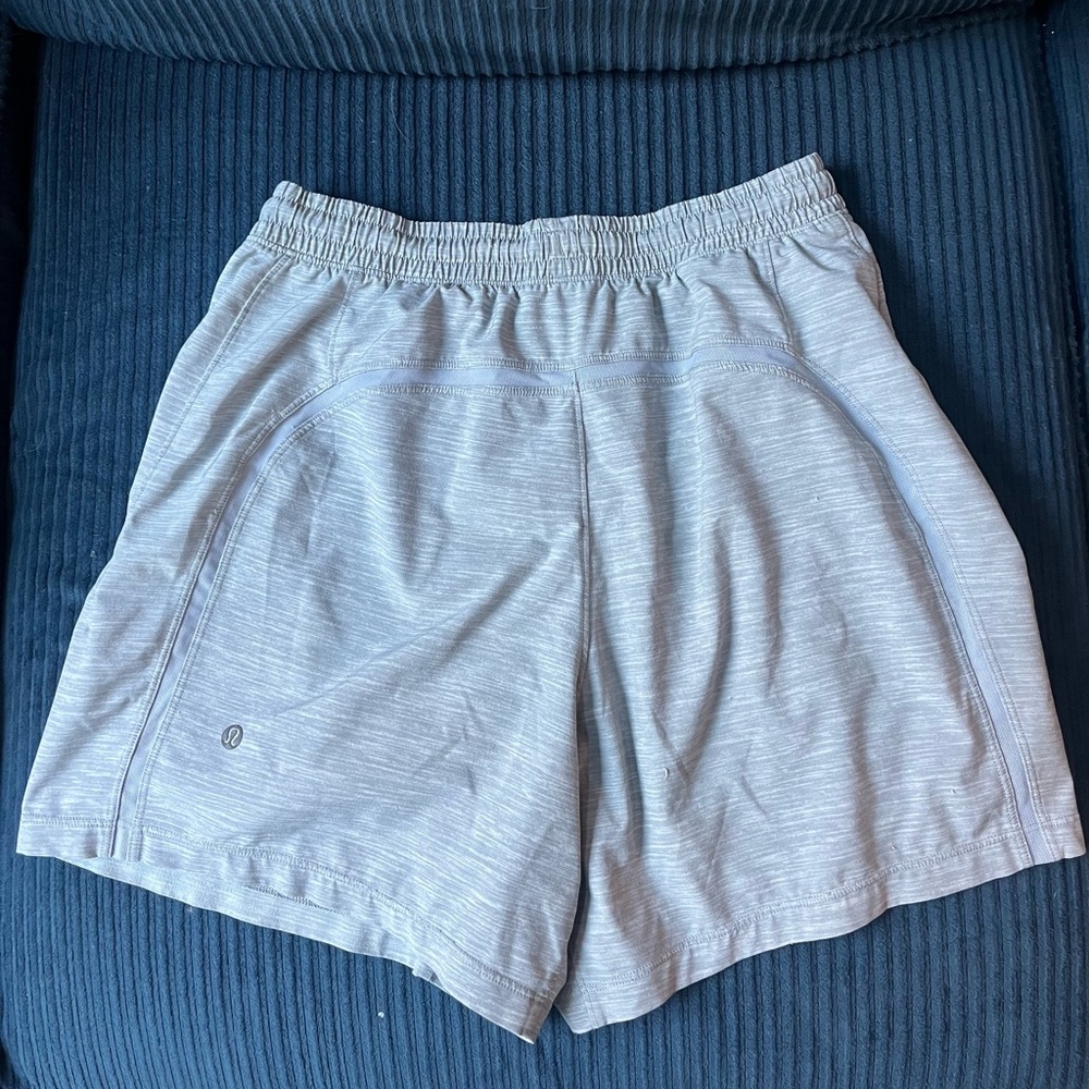 Men’s gray pace breaker 5 inch inseam lululemon shorts in good condition.